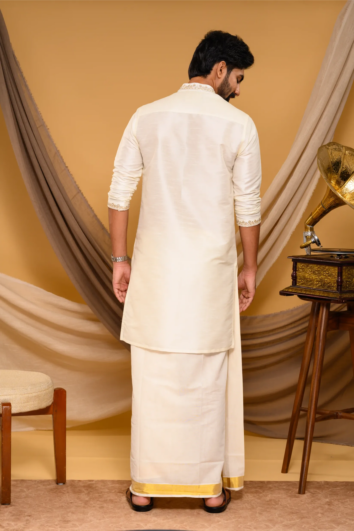 Off- White Silk Kurta with Hand Embroidery detailing on Neck, placket edge & sleeve edge - floral body spread work (Kurta + Munde + Melmunde)