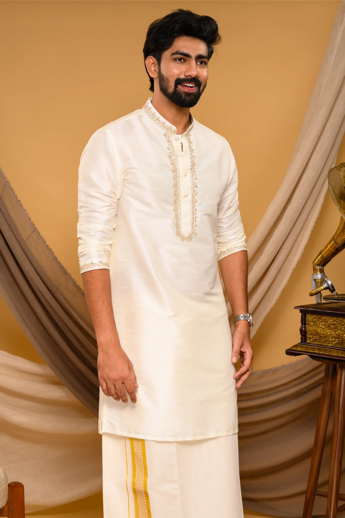 Off- White Silk Kurta with Hand Embroidery detailing on Neck, placket edge & sleeve edge - floral body spread work (Kurta + Munde + Melmunde)