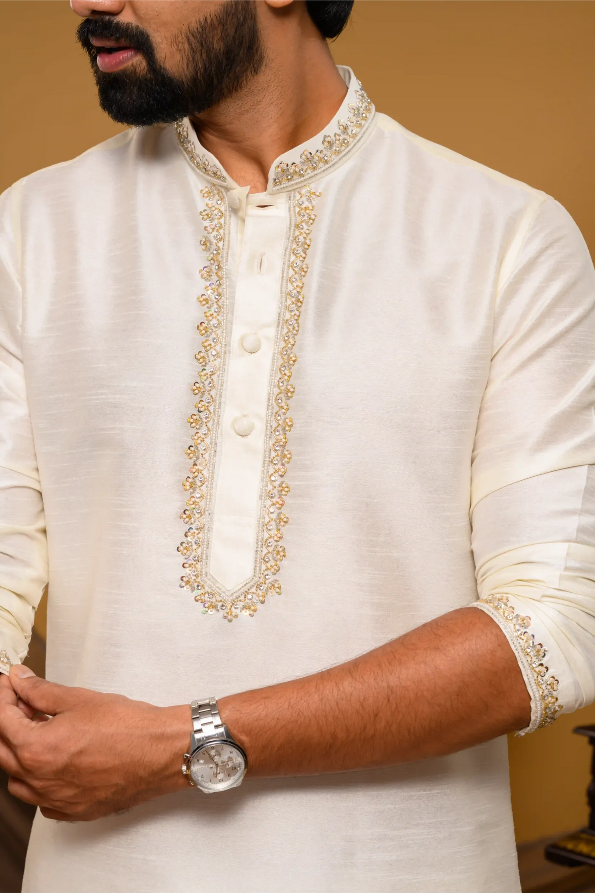 Off- White Silk Kurta with Hand Embroidery detailing on Neck, placket edge & sleeve edge - floral body spread work (Kurta + Munde + Melmunde)