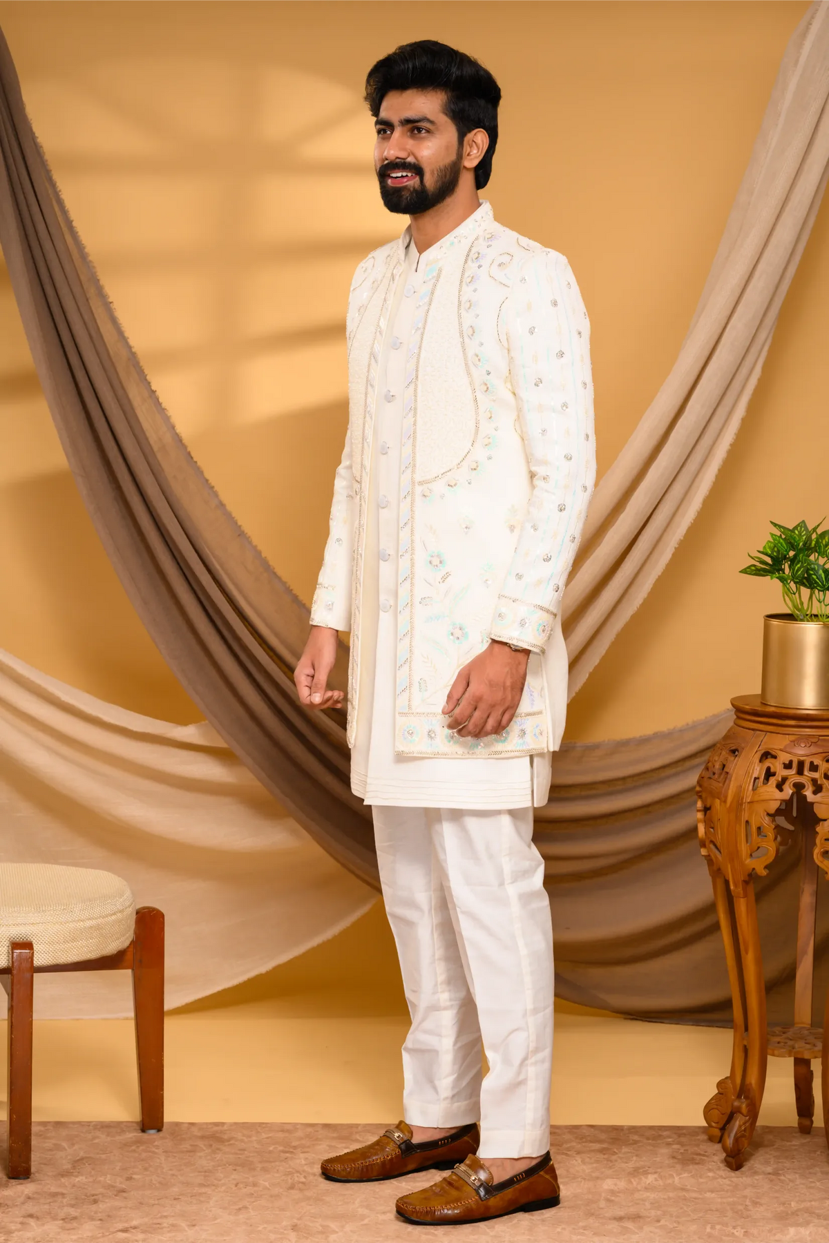 Ivory Shade Open Indo Western Slim Jacket with floral hand embroidery & surface embroidery paired with Kurta & Narrow Pants (Set of 3)