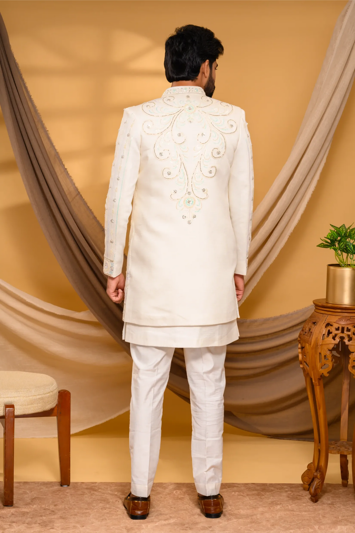 Ivory Shade Open Indo Western Slim Jacket with floral hand embroidery & surface embroidery paired with Kurta & Narrow Pants (Set of 3)