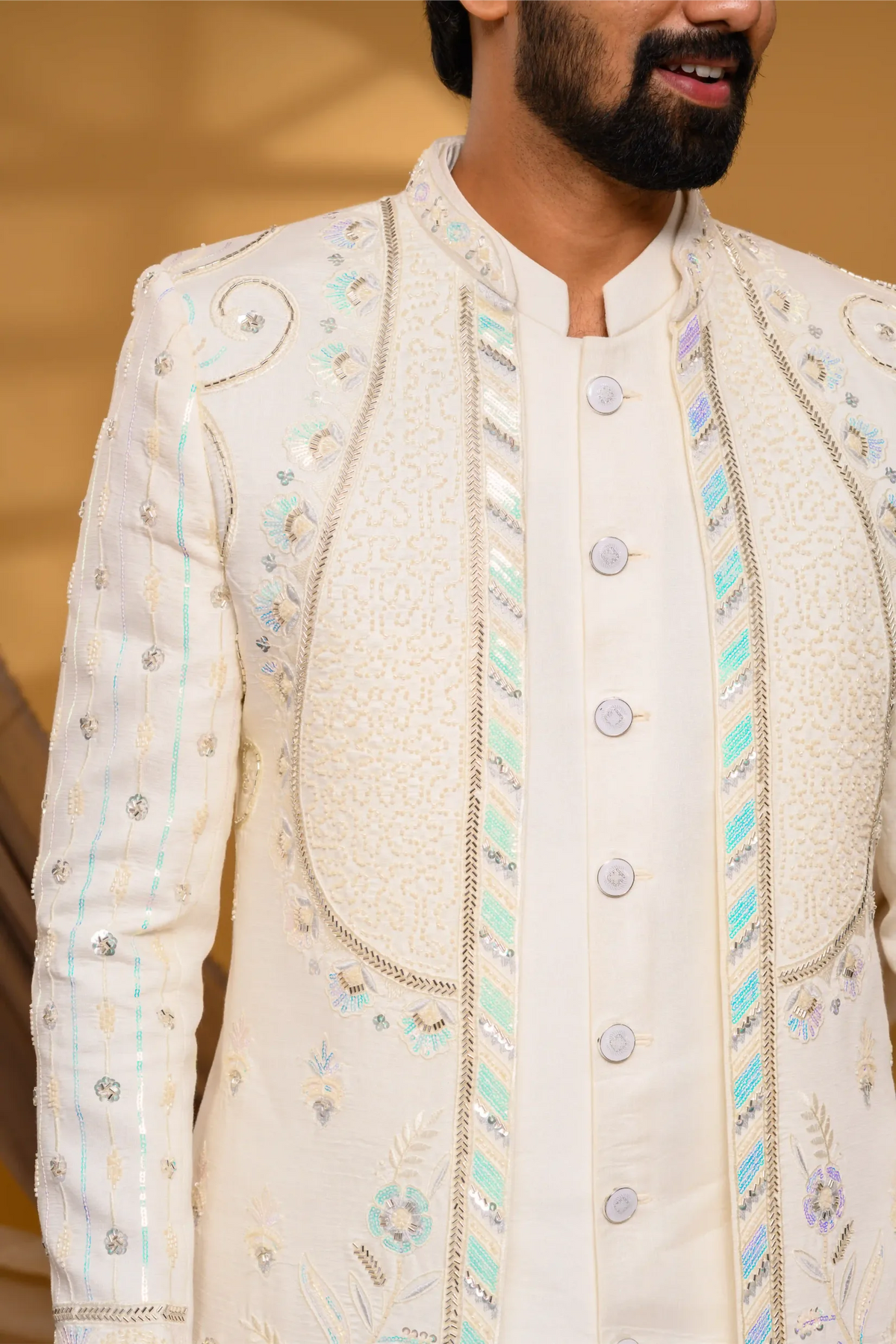 Ivory Shade Open Indo Western Slim Jacket with floral hand embroidery & surface embroidery paired with Kurta & Narrow Pants (Set of 3)