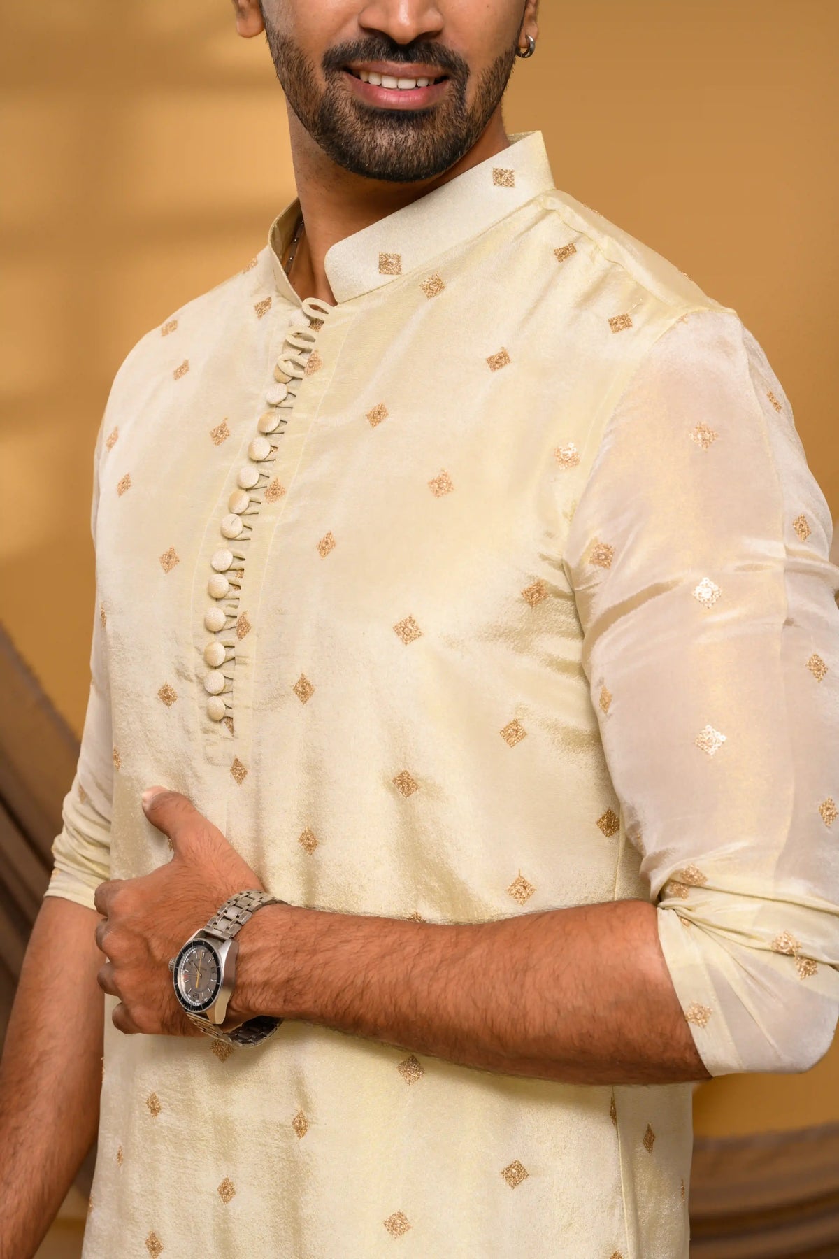 Light golden tissue silk kurta with elegant buta detailing by Archers Lounge