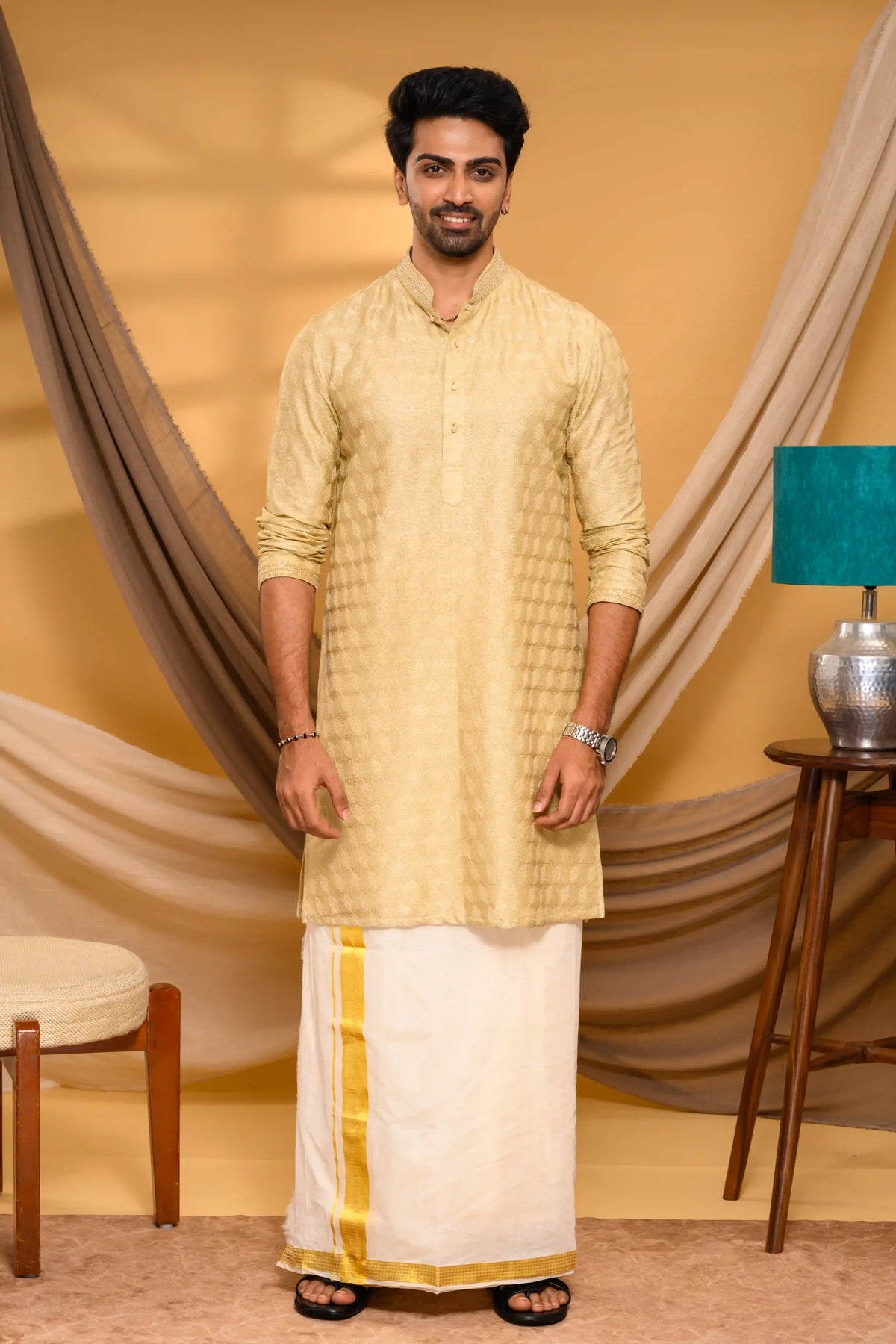 Golden Silk Kurta with all over Surface Embroidery & Neck/Sleeve Zari Detailing (Kurta + Munde)