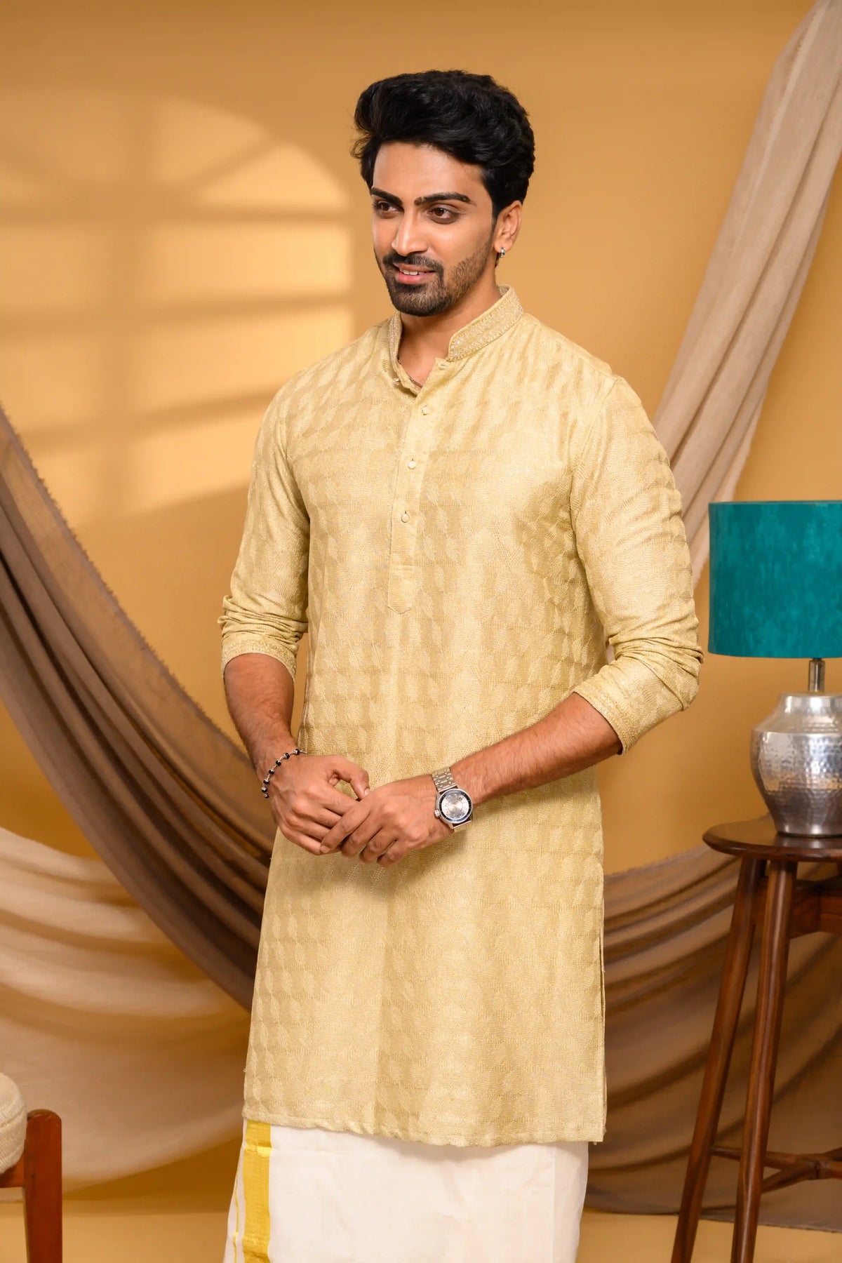 Golden Silk Kurta with all over Surface Embroidery & Neck/Sleeve Zari Detailing (Kurta + Munde)