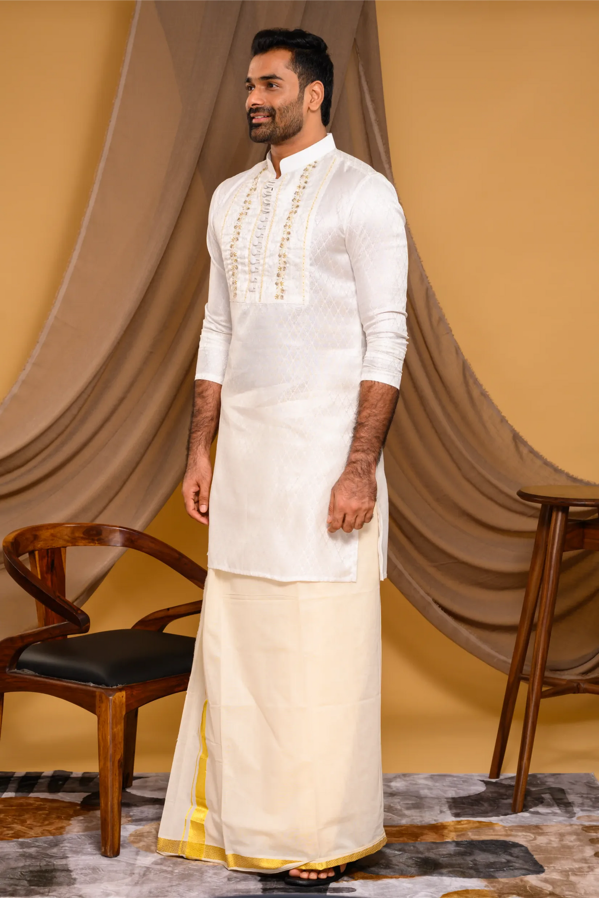 Ivory Silk Brocade Kurta with Heavy Golden Handwork detailing on wide Placket Border (Kurta + Munde)