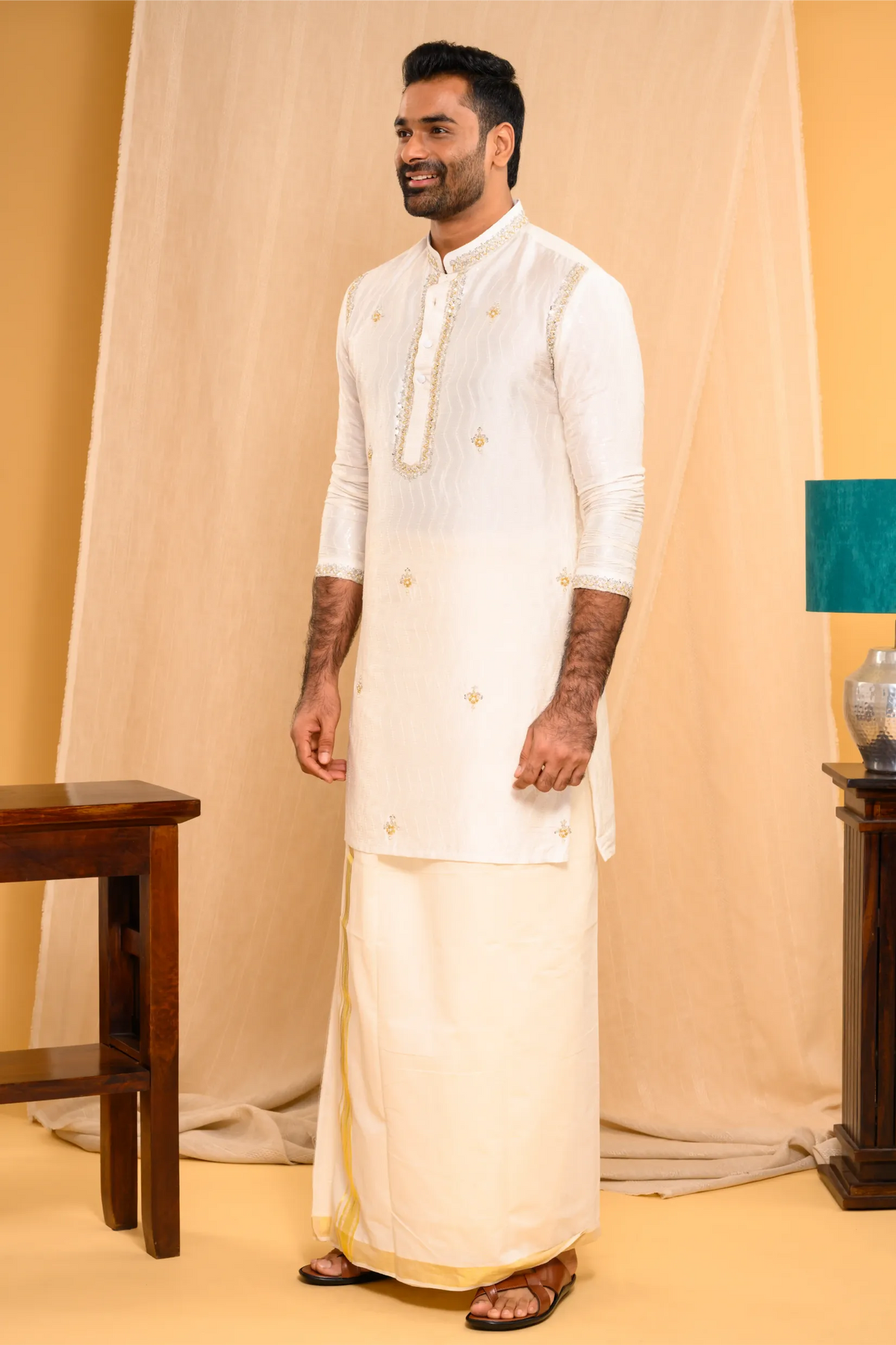 Ivory Silk Kurta with floral embroidery detailing on Shoulder Lines, Sleeves Edge & Neck (Kurta Only)