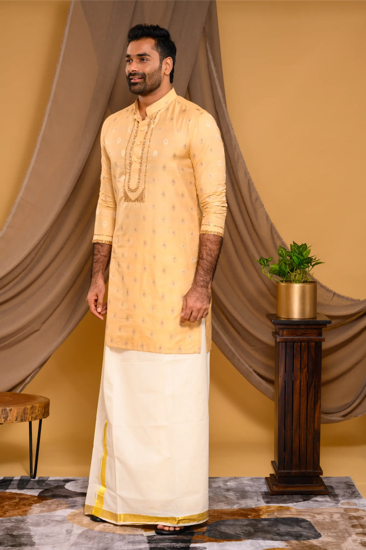 Golden Silk Brocade Kurta with Heavy Golden Handwork detailing on wide placket border & sleeve edge (Kurta + Munde)