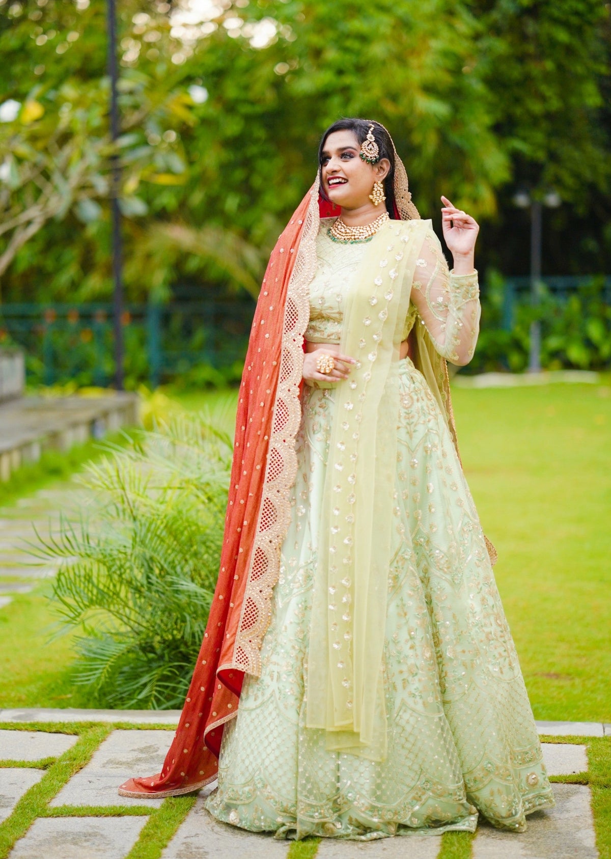 Pastel Green/ Red Bridal Lehenga Detailed with Light Gold Embroidery