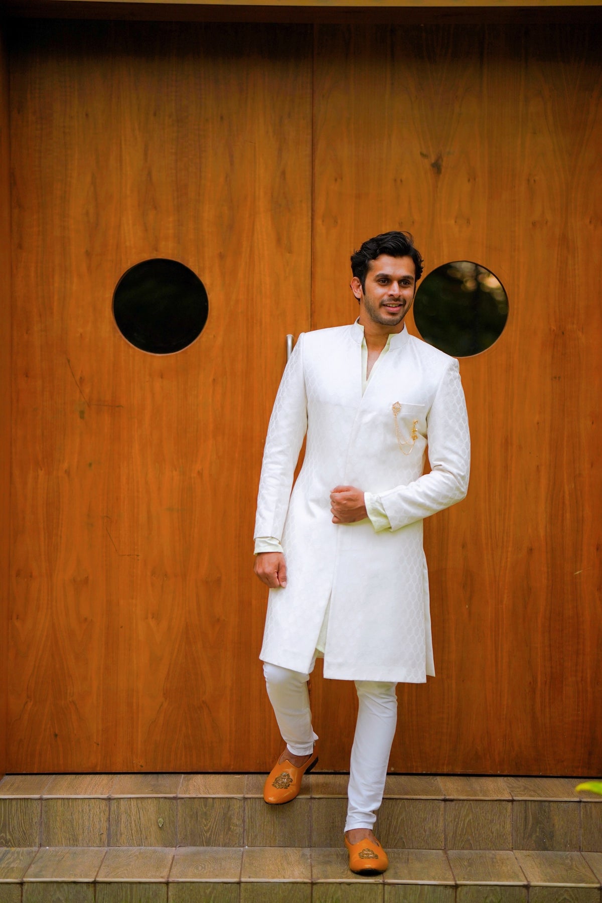 Off White Brocade Indo Western Slim Achkan Suit paired with White Kurta & White Narrow Pants (Set of 3)