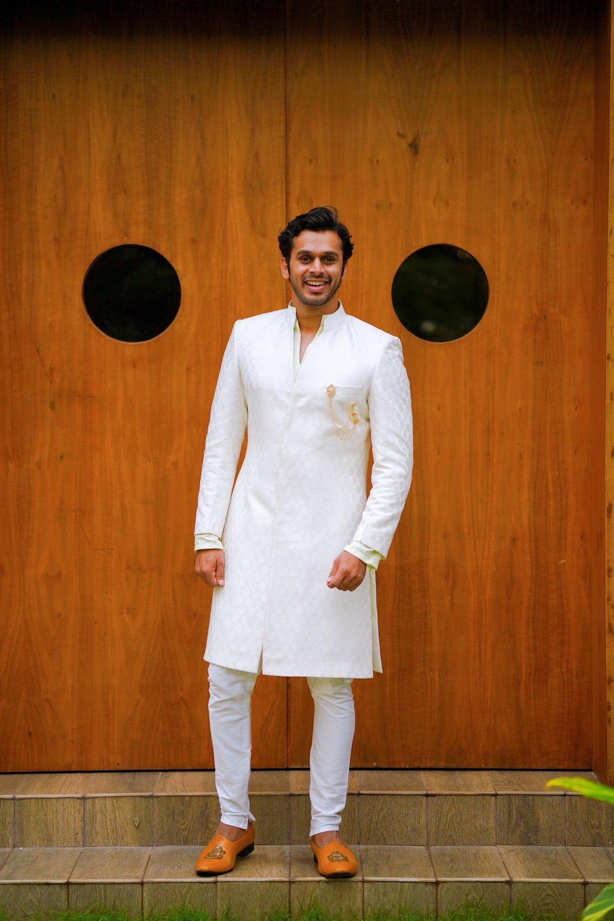 Off White Brocade Indo Western Slim Achkan Suit paired with White Kurta & White Narrow Pants (Set of 3)