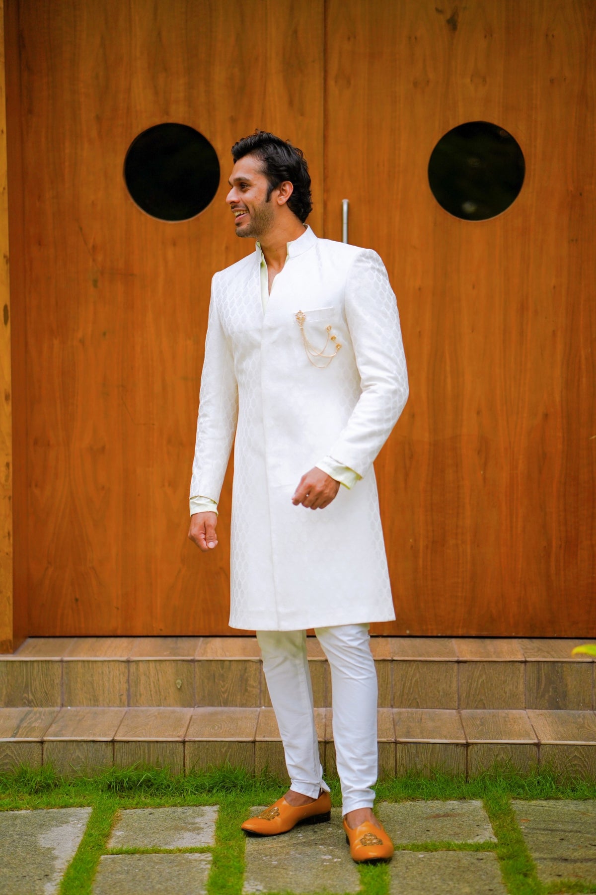 Off White Brocade Indo Western Slim Achkan Suit paired with White Kurta & White Narrow Pants (Set of 3)