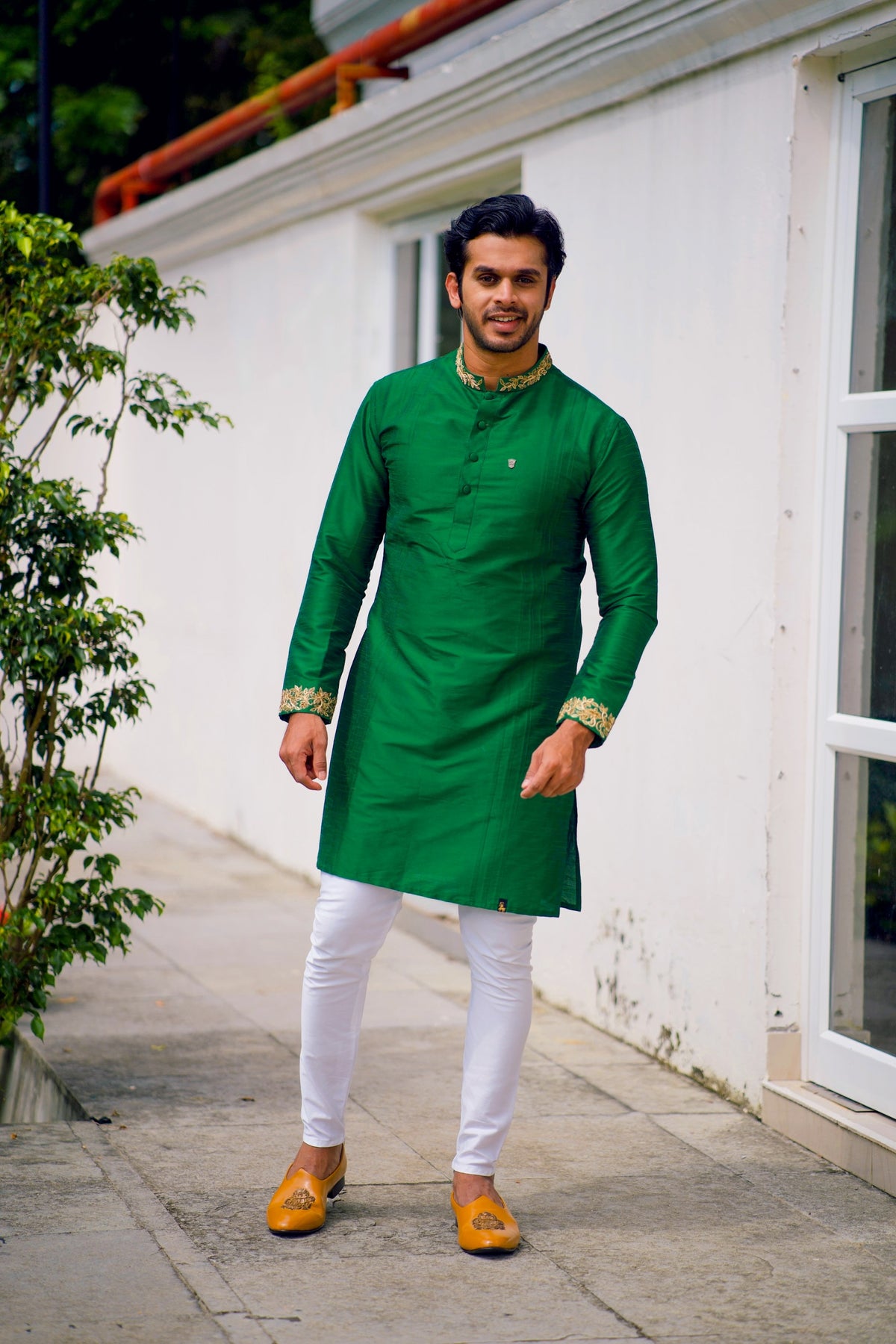 Cadmium Green Kurta Set Detailed with Handwork on Neck & Sleeves (Kurta + White Bottom Pants)