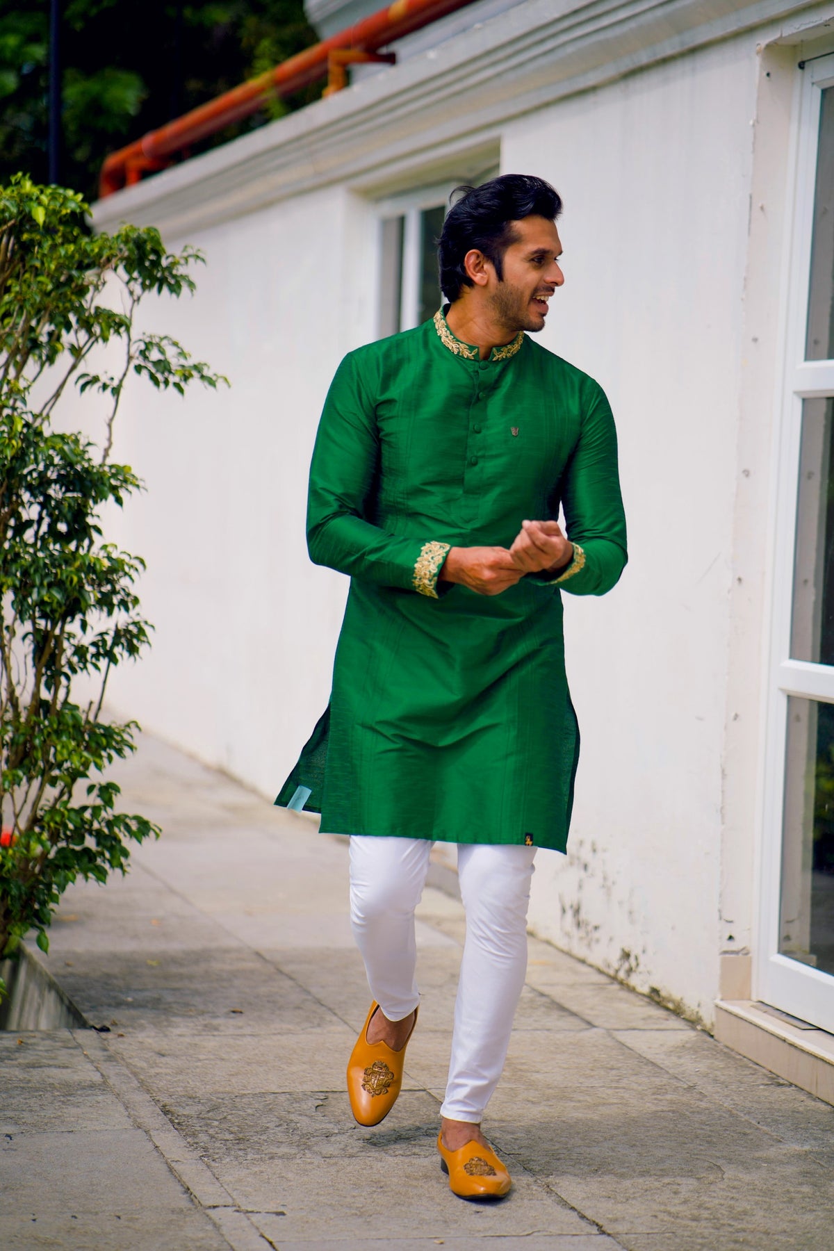 Cadmium Green Kurta Set Detailed with Handwork on Neck & Sleeves (Kurta + White Bottom Pants)