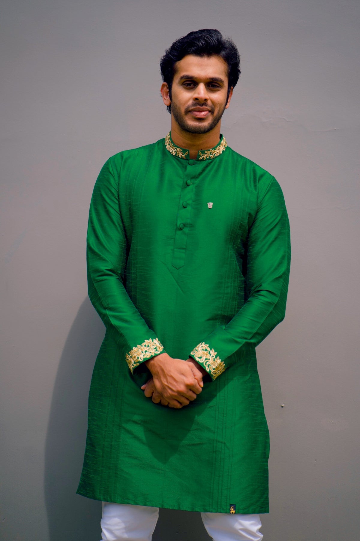 Cadmium Green Kurta Set Detailed with Handwork on Neck & Sleeves (Kurta + White Bottom Pants)