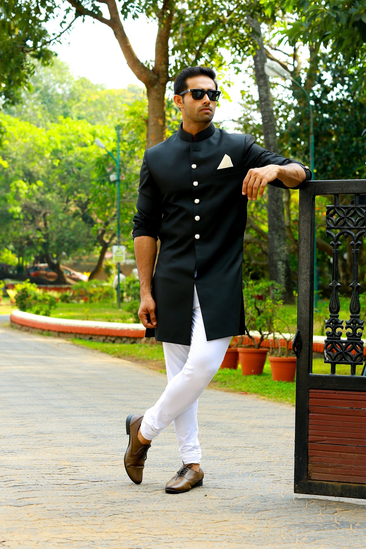 Jet Black Indo Western Slim Achkan Suit paired with White Narrow Pants (Set of 2)