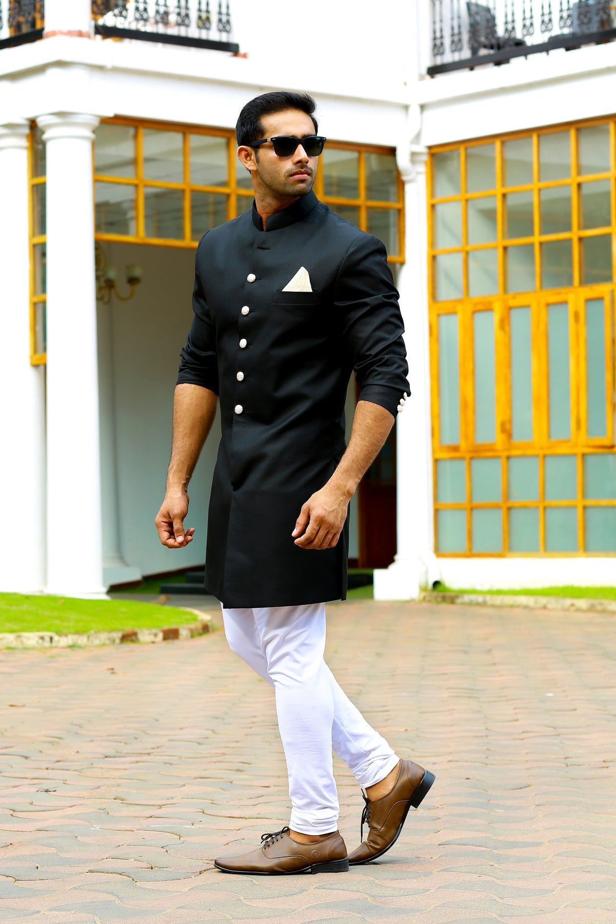 Jet Black Indo Western Slim Achkan Suit paired with White Narrow Pants (Set of 2)