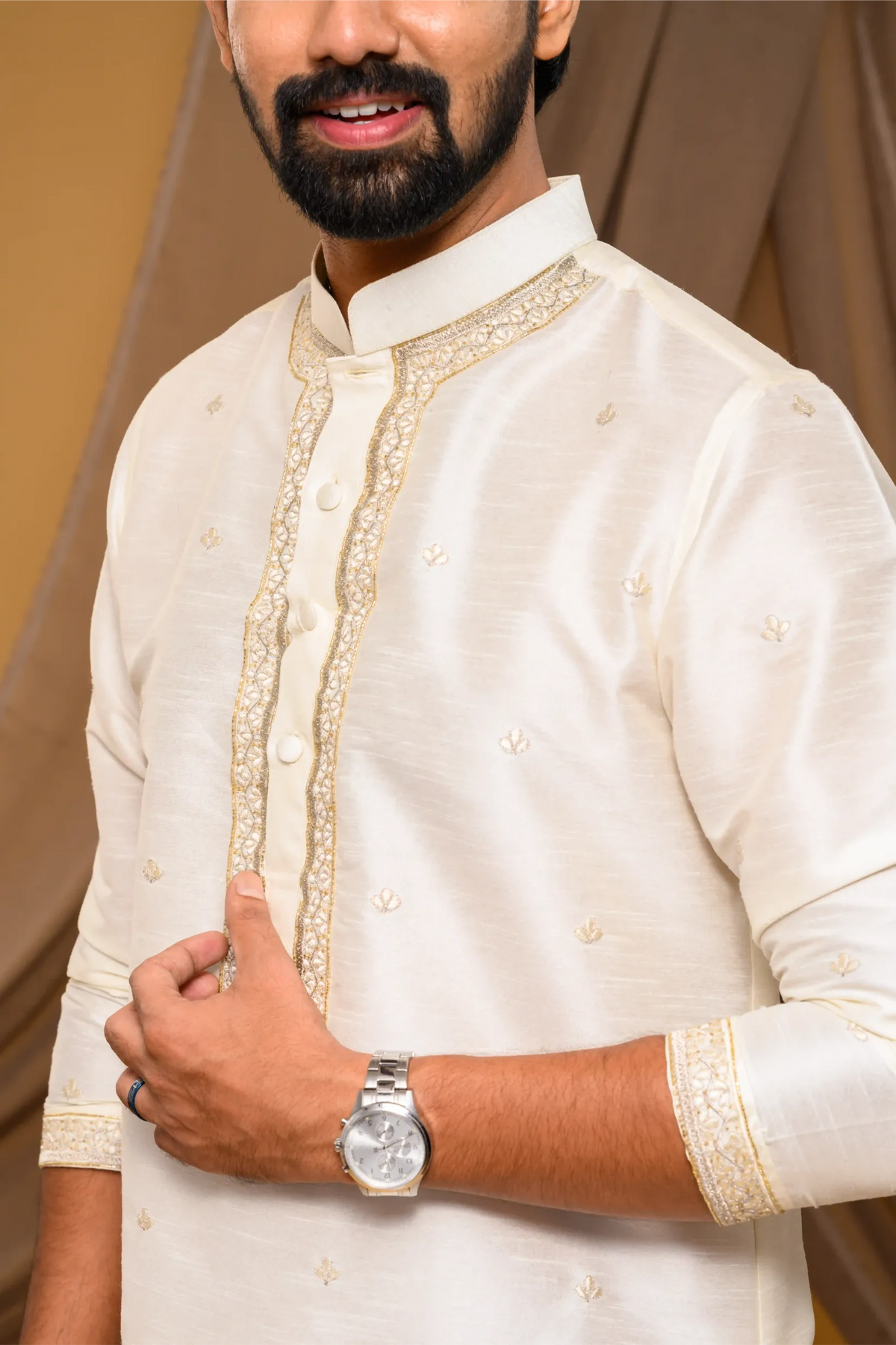 Off- White Silk Kurta with Hand Embroidery detailing on placket, neck border & sleeve edge - floral body spread work (Kurta)
