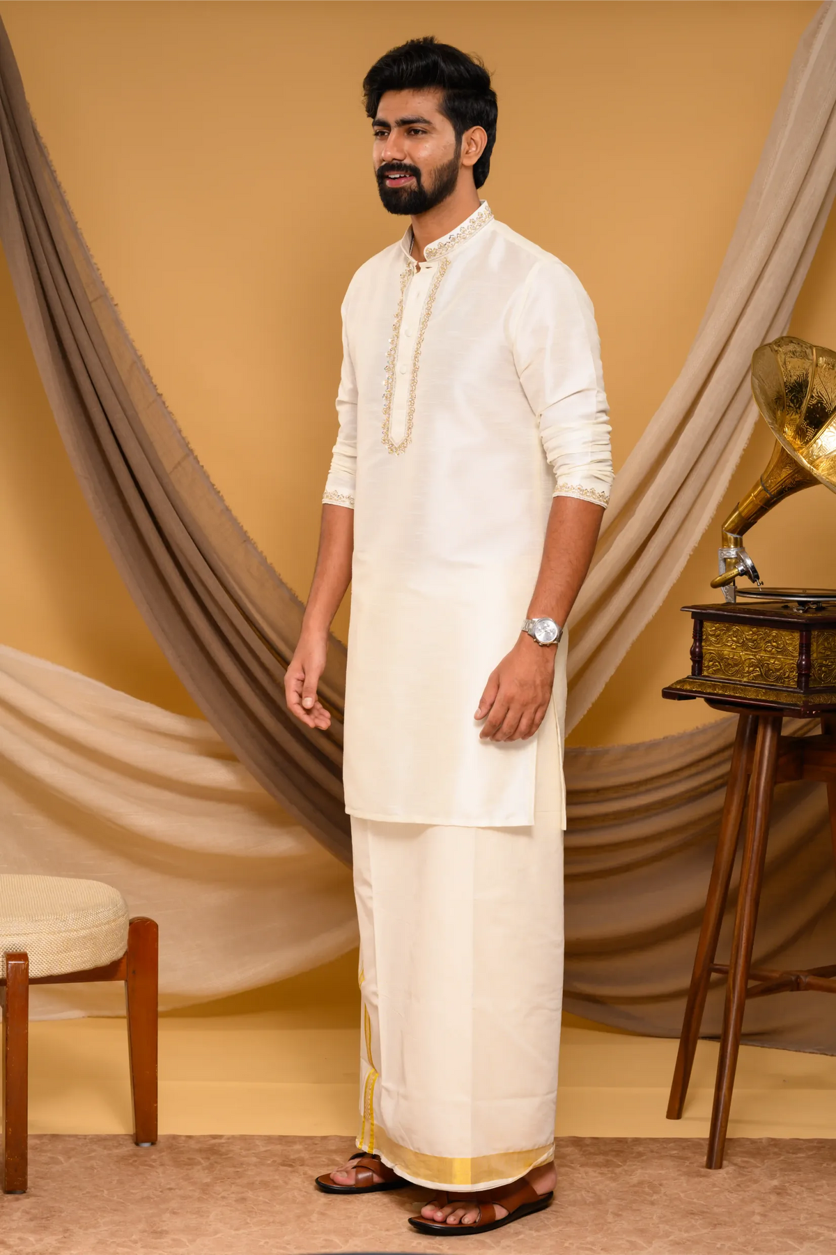 Off- White Silk Kurta with Hand Embroidery detailing on Neck, placket edge & sleeve edge - floral body spread work (Kurta + Munde + Melmunde)