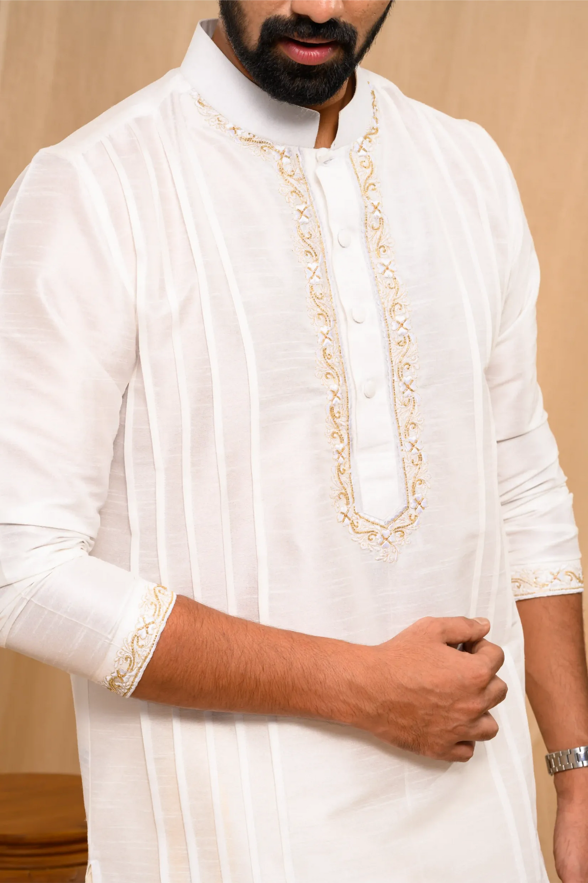 Off- White Silk Kurta with Hand Embroidery detailing  on placket, neck border & sleeve edge (Kurta + Munde + Melmunde)