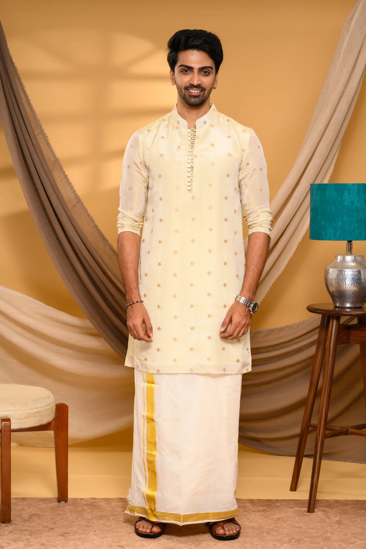 Light golden tissue silk kurta with elegant buta detailing by Archers Lounge
