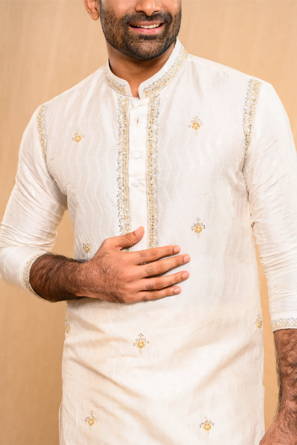 Ivory Silk Kurta  with floral embroidery detailing on Shoulder Lines, Sleeves Edge & Neck (Kurta Only)