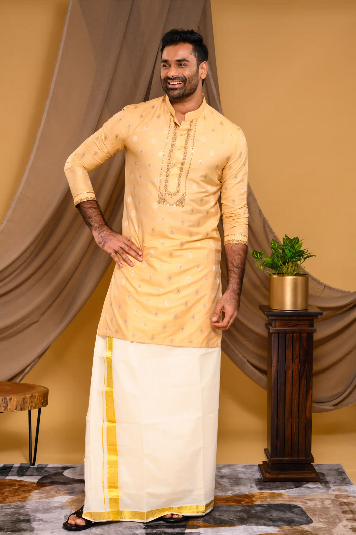 Golden Silk Brocade Kurta with Heavy Golden Handwork detailing on wide placket border & sleeve edge (Kurta + Munde)