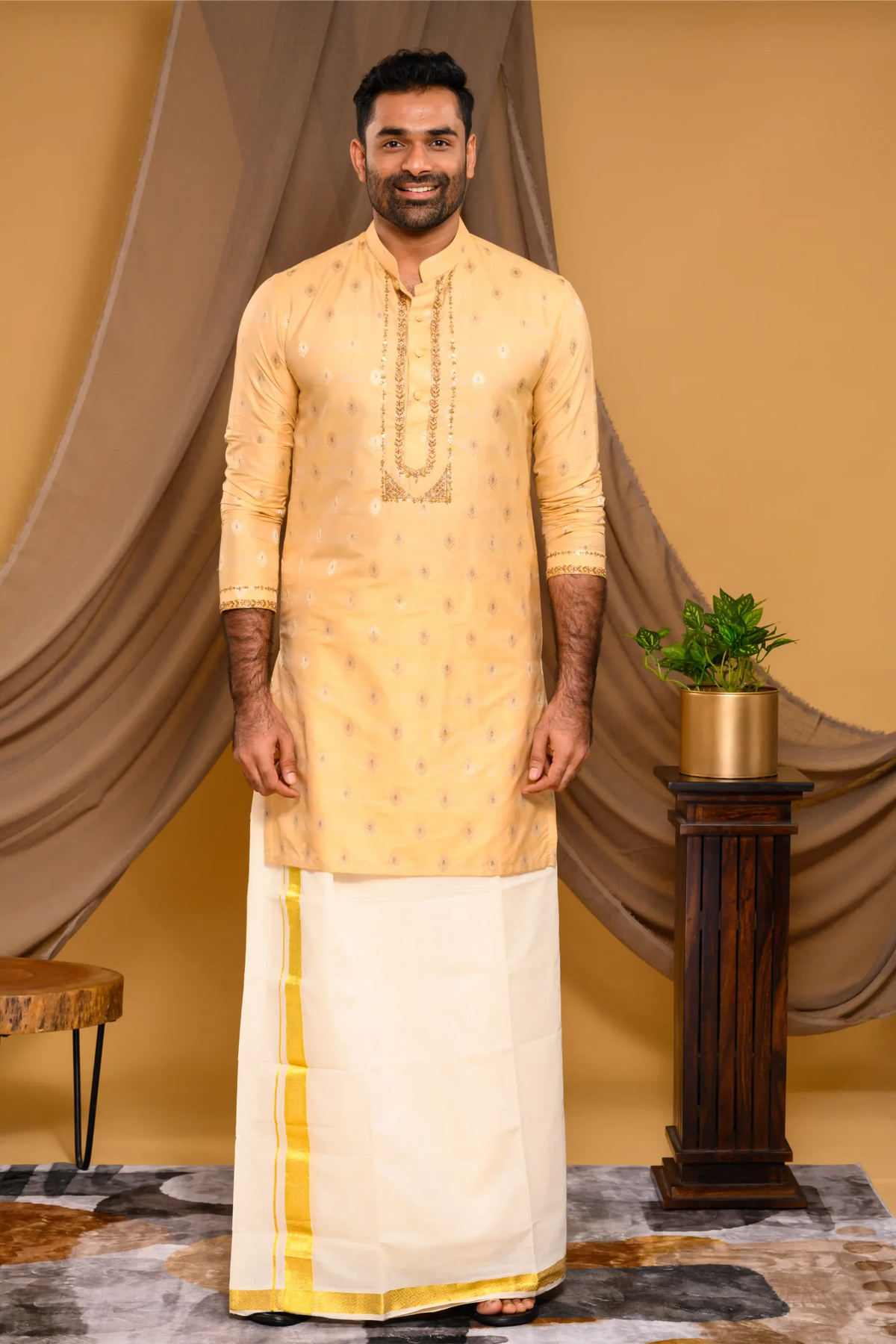 Golden Silk Brocade Kurta with Heavy Golden Handwork detailing on wide placket border & sleeve edge (Kurta + Munde)