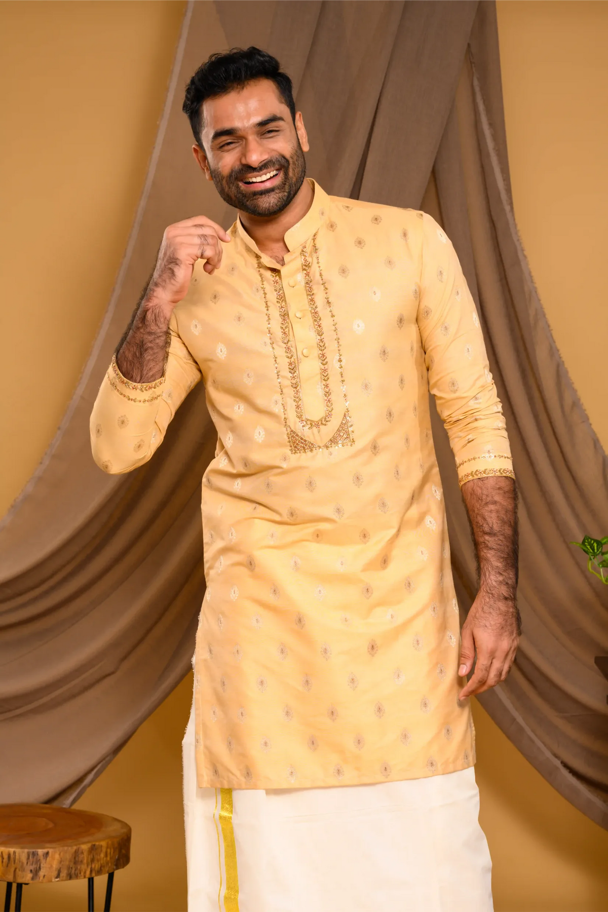 Golden Silk Brocade Kurta with Heavy Golden Handwork detailing on wide placket border & sleeve edge (Kurta + Munde)