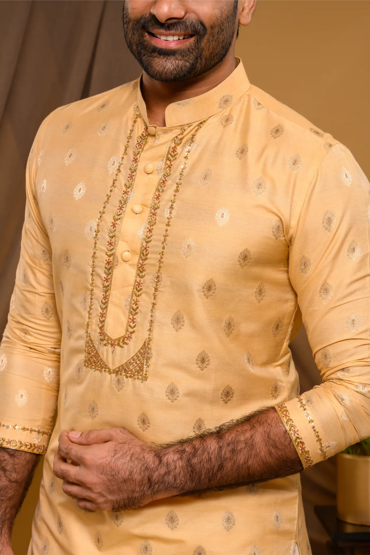 Golden Silk Brocade Kurta with Heavy Golden Handwork detailing on wide placket border & sleeve edge (Kurta + Munde)