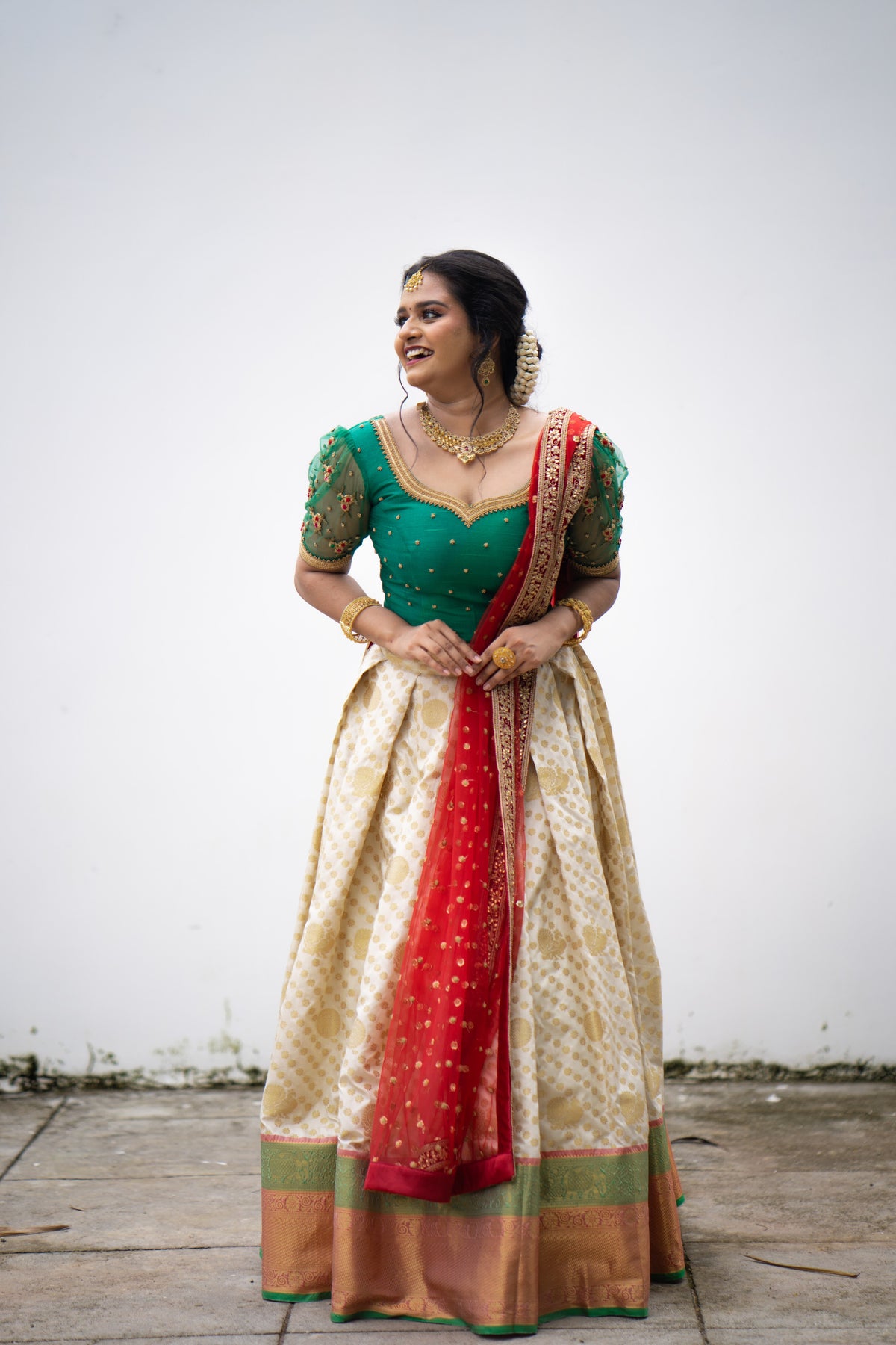 Cadmium Green/ Beige Traditional Lehenga Detailed Red & Gold hand Embroidery