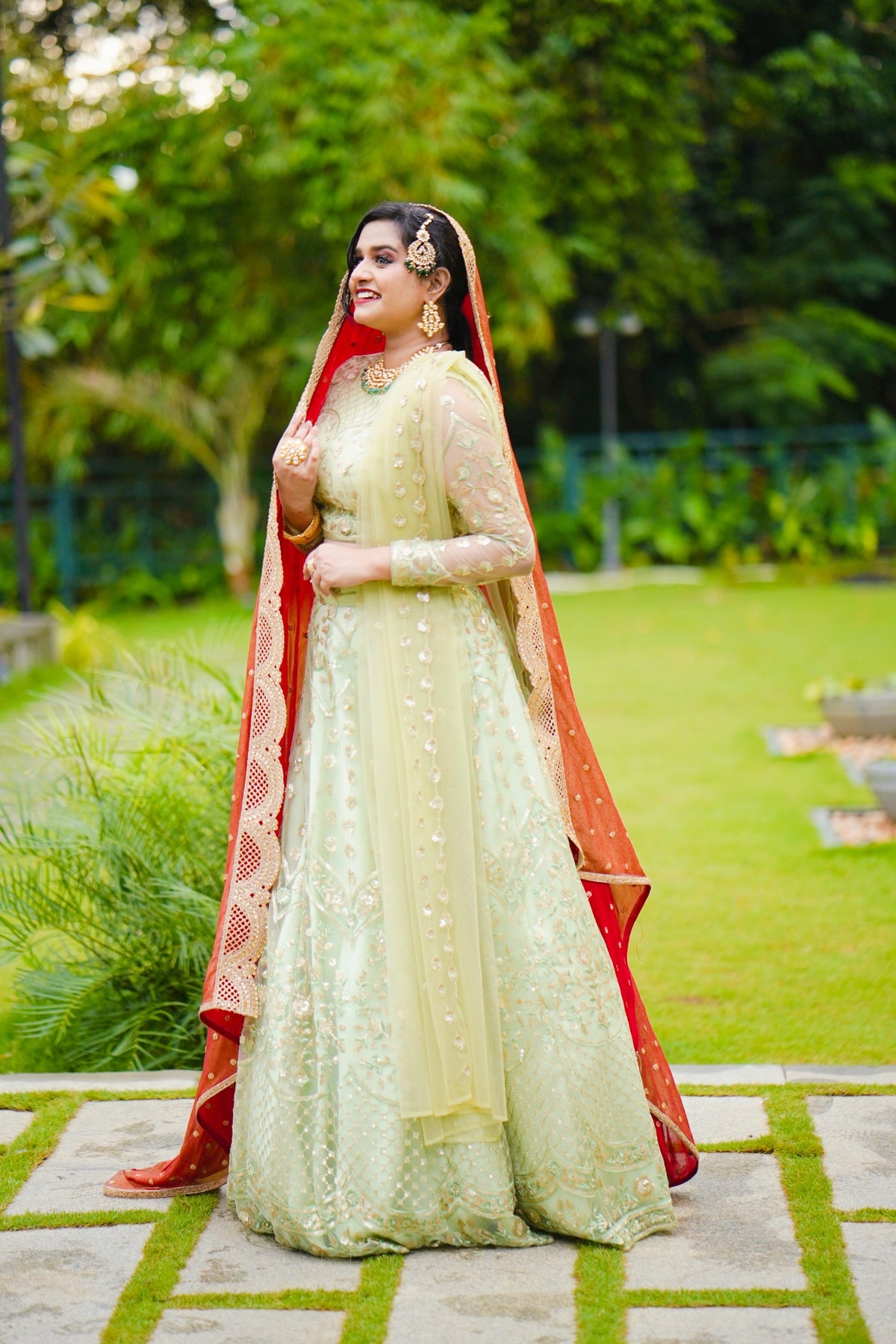 Pastel Green/ Red Bridal Lehenga Detailed with Light Gold Embroidery