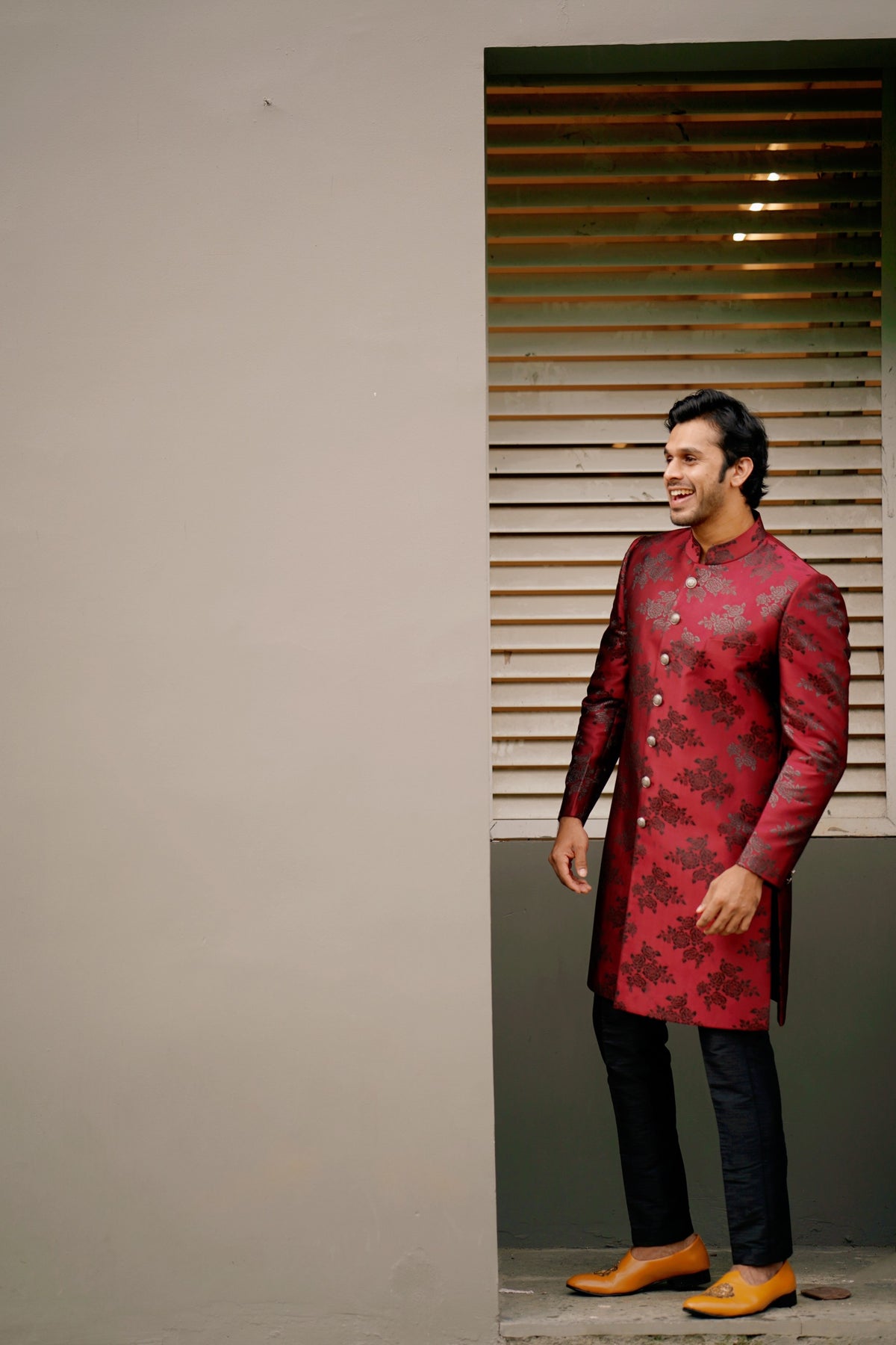 Floral Print Sangria Red Indo Western Slim Achkan Suit  paired with Black Naroow Pants (Set of 3)