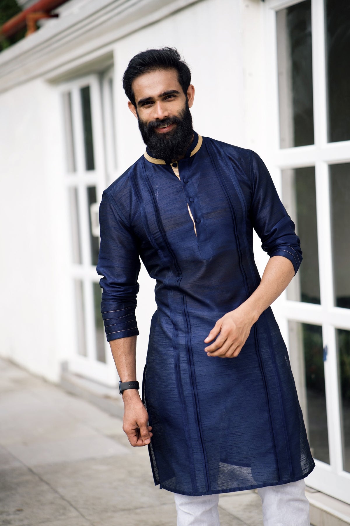 Navy Blue Pleated Kurta Set with Golden Detailing  (Kurta + White Bottom Pants)