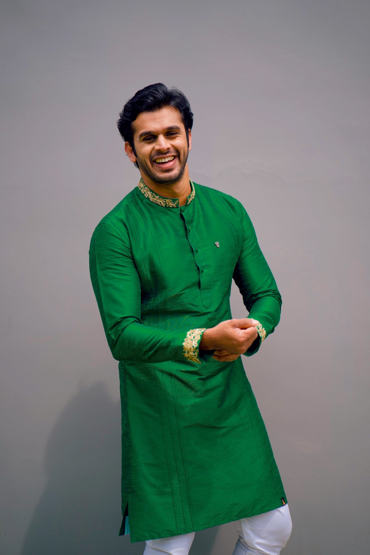 Cadmium Green Kurta Set Detailed with  Handwork on Neck & Sleeves (Kurta + White Bottom Pants)