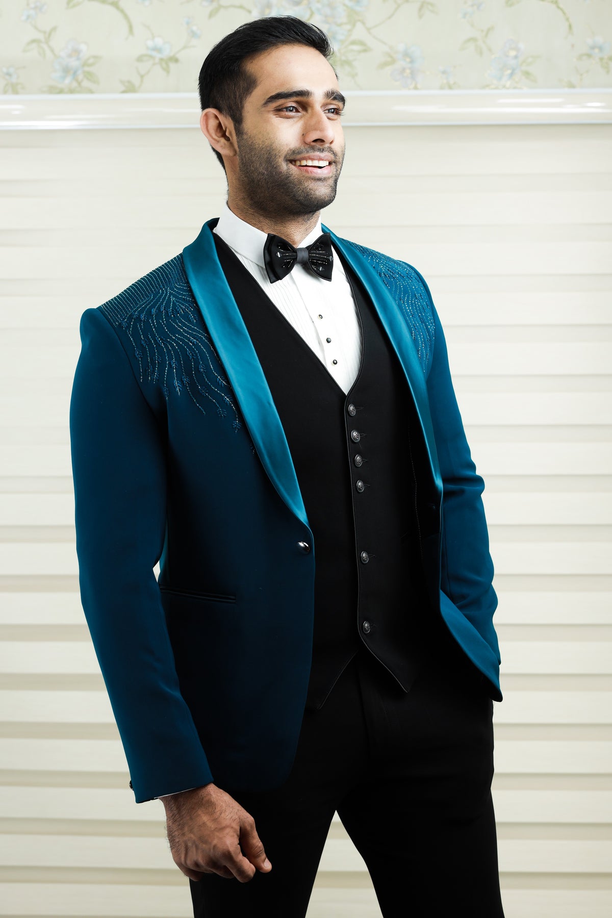 Teal Blue 3 Piece Tuxedo Suit detailied with Shoulder Embroidery paired with Contrast Black Waistcoat (Set of 4)