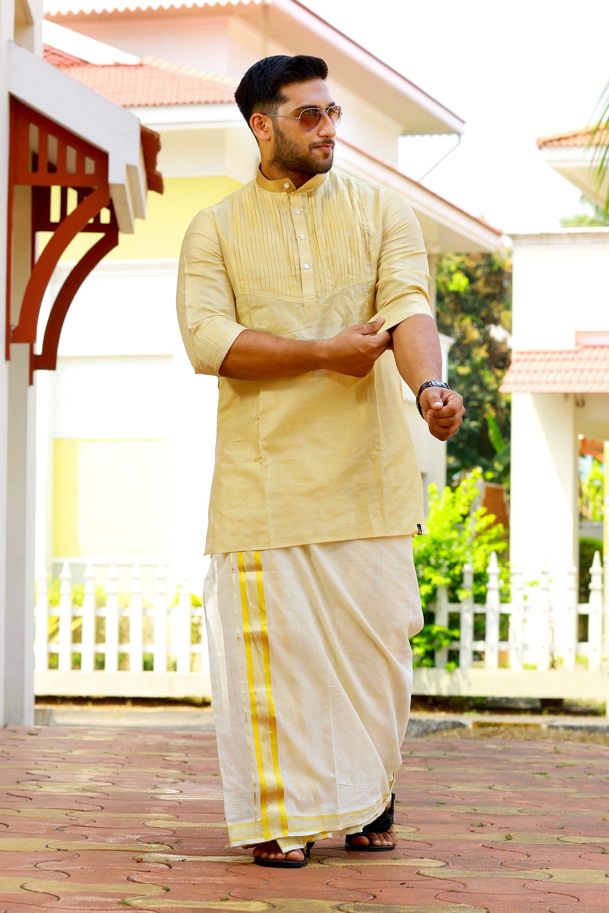 Golden Vertical Pleated Kurta Set with Gold Zari Detailing on Neck (Kurta + Kasavu Munde)