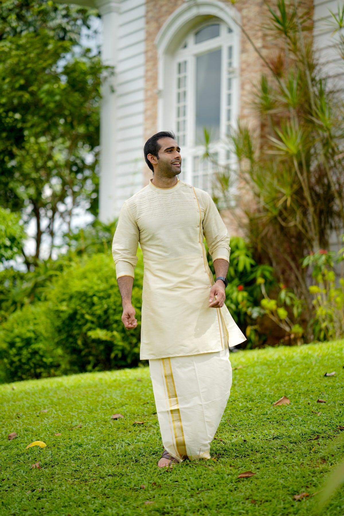Parchment Cream Wedding Kurta Set with  Sequence & Horizontal Zari Thread  Golden Detailing  (Kurta + Kasavu Munde)